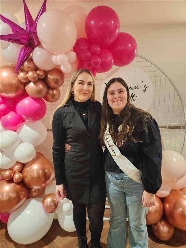 Nexus staff member with Capacity Building Client, Tameria