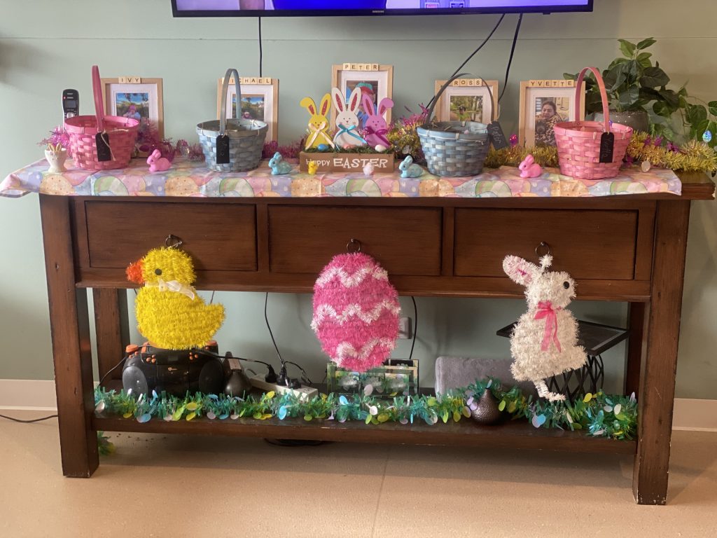 A festive Easter display at a Nexus Supported Independent Living home, with egg, rabbit and chicken decorations and Easter baskets ready to be filled with chocolate eggs.